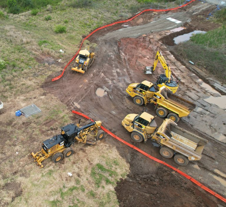 Image shows an ariel view of heavy machinery at a project by Convil Group