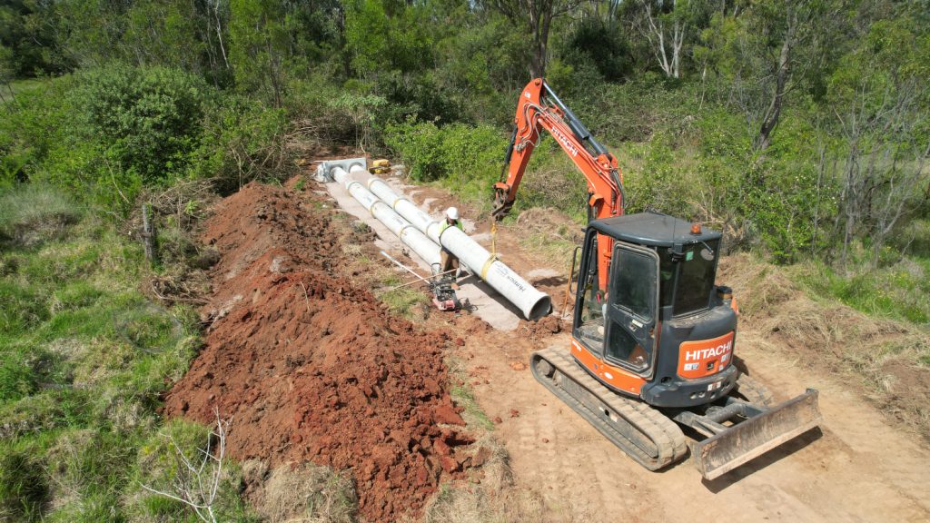 Image shows convil group undertaking a project to construct drainage works